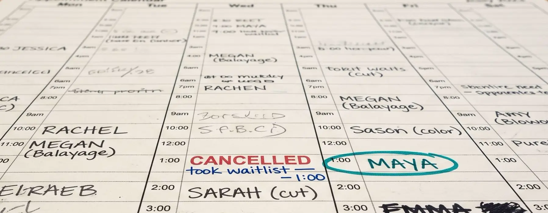 Paper appointment book — a canceled time filled from the waitlist.